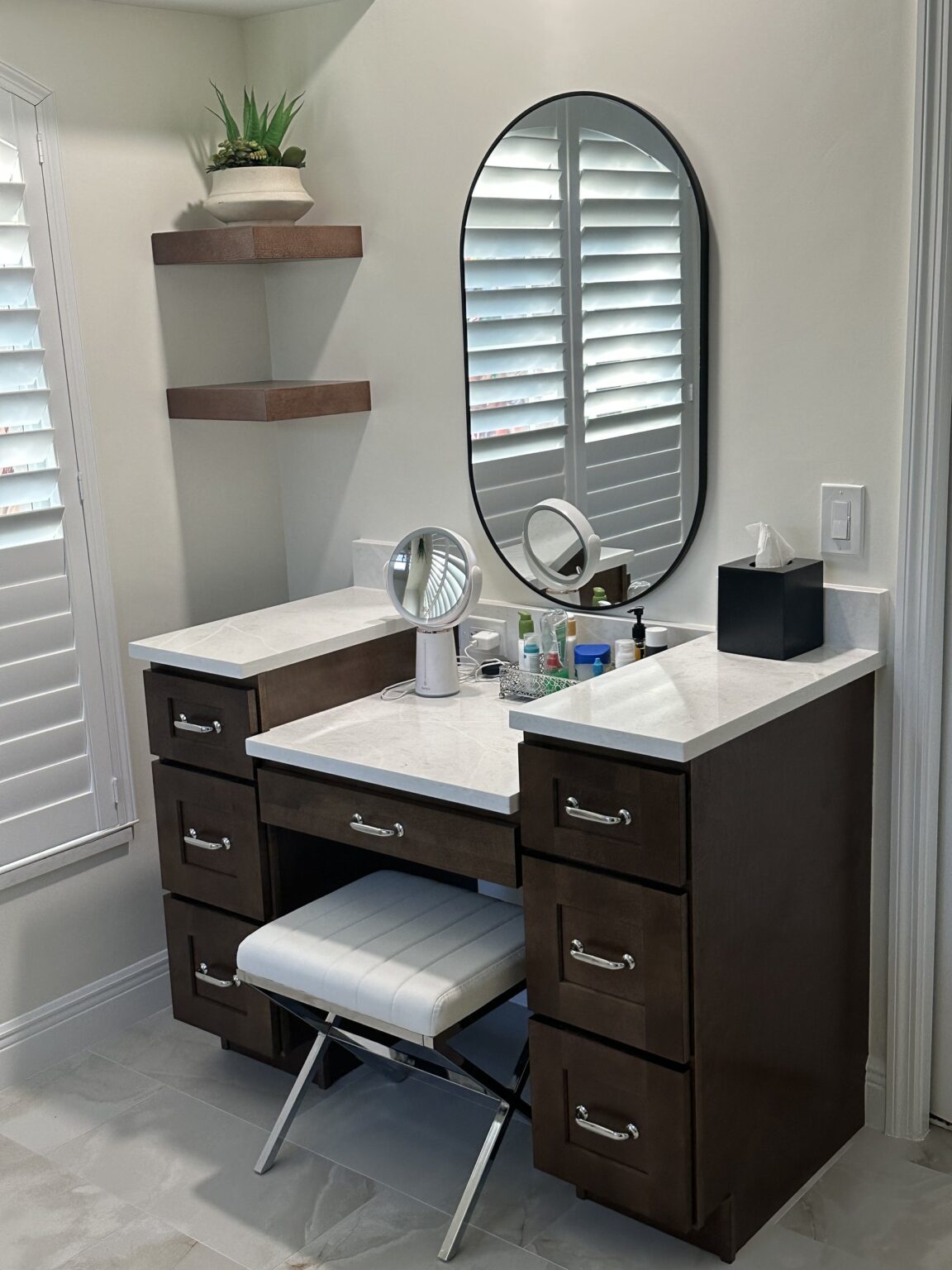 Remodeled bathroom vanity with a built-in makeup station